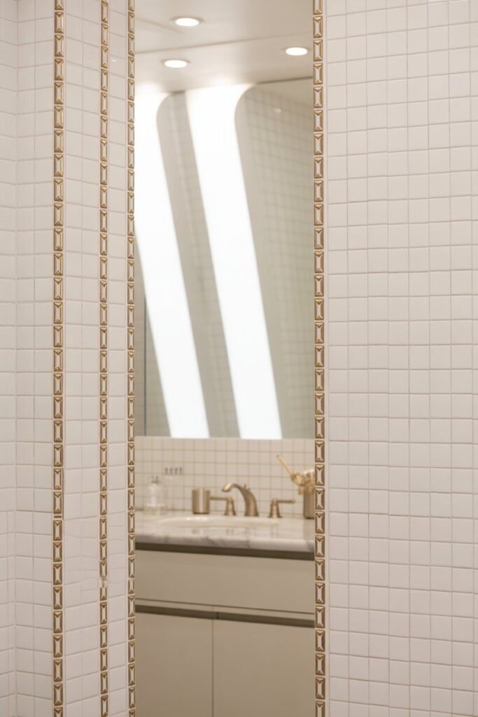 white and golden bathroom 5 White tiles golden border bathroom
